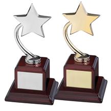 Gold and Silver Finish Shooting Stars on Piano Wood Bases.